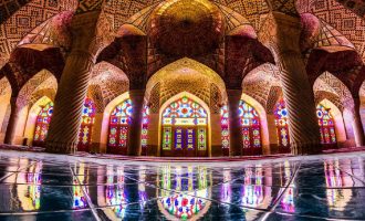 Mosque built in Persian Architecture, with beautiful painting on the glass doors and windows, the architechtural designs giving a royal look.