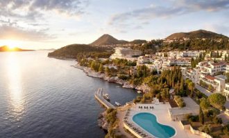 A aerial view of a beautiful location with sea and resort with spa.